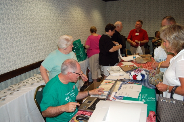 Committee Working Hard at the  Check in table